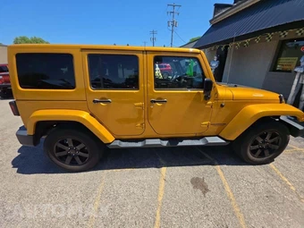 2014 Jeep Wrangler Unlimited Altitude Edition - miniatura 4