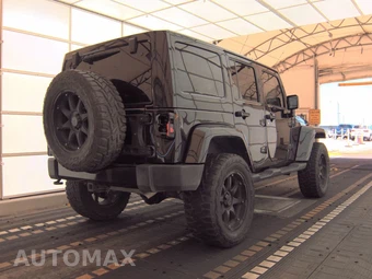 2014 Jeep Wrangler Unlimited Altitude Edition - miniatura 4