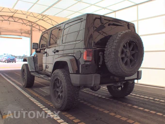 2014 Jeep Wrangler Unlimited Altitude Edition - miniatura 6