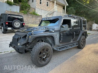 2014 Jeep Wrangler Unlimited Altitude Edition - car from the USA, Manheim Buy-Now listing at AUTOMAX