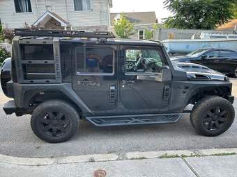 2014 Jeep Wrangler Unlimited Altitude Edition - miniatura 4