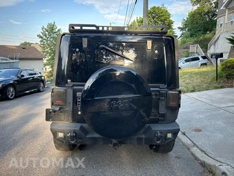 2014 Jeep Wrangler Unlimited Altitude Edition - miniatura 8