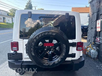 2014 Jeep Wrangler Unlimited Altitude Edition - miniatura 5