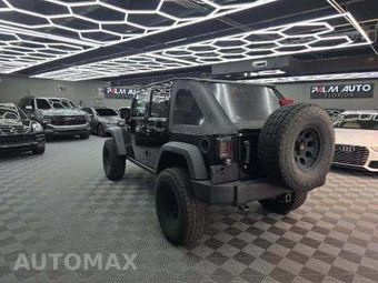 2014 Jeep Wrangler Unlimited Rubicon - miniatura 2
