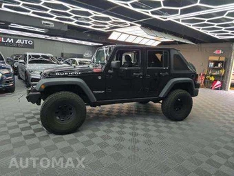2014 Jeep Wrangler Unlimited Rubicon - miniatura 32