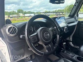 2014 Jeep Wrangler Unlimited Sahara - miniatura 10
