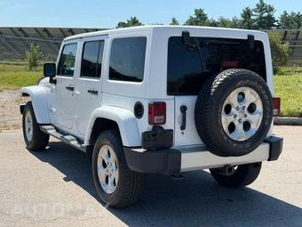 2014 Jeep Wrangler Unlimited Sahara - miniatura 3