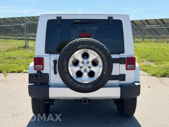 2014 Jeep Wrangler Unlimited Sahara - miniatura 4