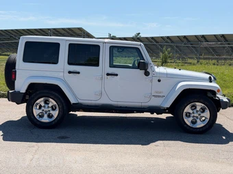 2014 Jeep Wrangler Unlimited Sahara - miniatura 6