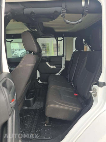 2014 Jeep Wrangler Unlimited Sahara - miniatura 10