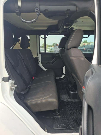 2014 Jeep Wrangler Unlimited Sahara - miniatura 13