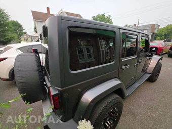 2014 Jeep Wrangler Unlimited Sahara - miniatura 3