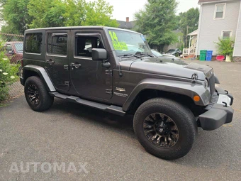 2014 Jeep Wrangler Unlimited Sahara - miniatura 4