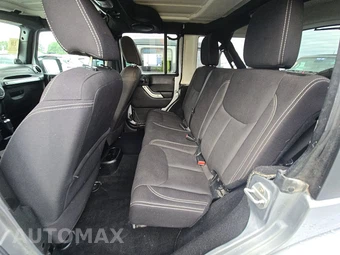 2014 Jeep Wrangler Unlimited Sahara - miniatura 13