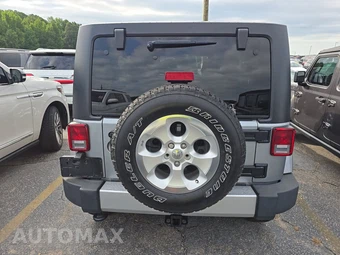2014 Jeep Wrangler Unlimited Sahara - miniatura 5
