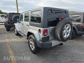 2014 Jeep Wrangler Unlimited Sahara - miniatura 6