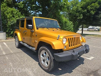 2014 Jeep Wrangler Unlimited Sahara - miniatura 4