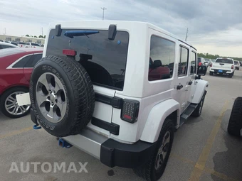 2014 Jeep Wrangler Unlimited Sahara - miniatura 4