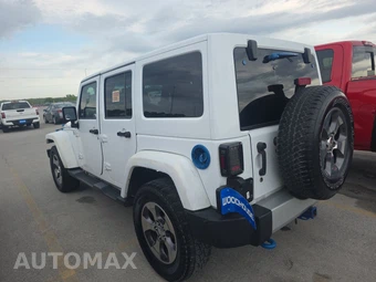 2014 Jeep Wrangler Unlimited Sahara - miniatura 6