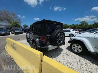 2014 Jeep Wrangler Unlimited Sahara - miniatura 2