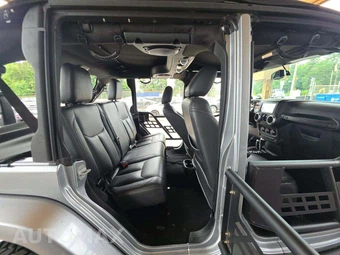 2014 Jeep Wrangler Unlimited Sahara - miniatura 16