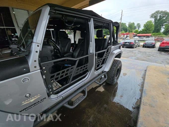 2014 Jeep Wrangler Unlimited Sahara - miniatura 24