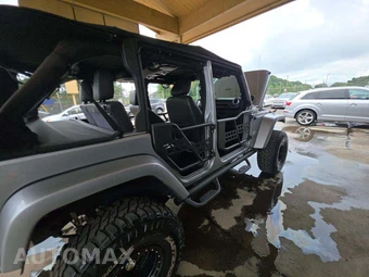2014 Jeep Wrangler Unlimited Sahara - miniatura 26