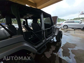 2014 Jeep Wrangler Unlimited Sahara - miniatura 27