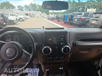 2014 Jeep Wrangler Unlimited Sahara - miniatura 10