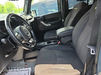 2014 Jeep Wrangler Unlimited Sahara - miniatura 13