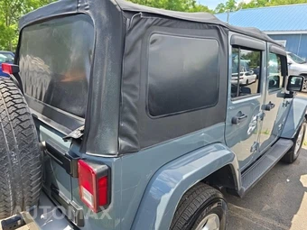2014 Jeep Wrangler Unlimited Sahara - miniatura 4