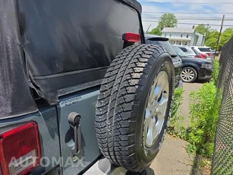 2014 Jeep Wrangler Unlimited Sahara - miniatura 5