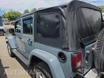 2014 Jeep Wrangler Unlimited Sahara - miniatura 6