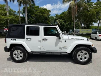 2014 Jeep Wrangler Unlimited Sahara - miniatura 4