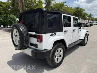 2014 Jeep Wrangler Unlimited Sahara - miniatura 6