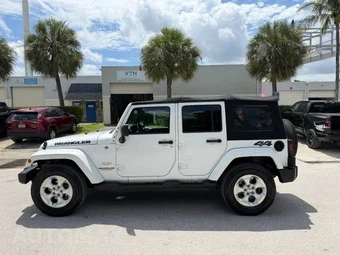 2014 Jeep Wrangler Unlimited Sahara - miniatura 9