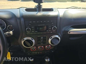 2014 Jeep Wrangler Unlimited Sahara - miniatura 7