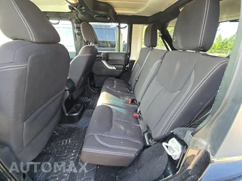 2014 Jeep Wrangler Unlimited Sahara - miniatura 13