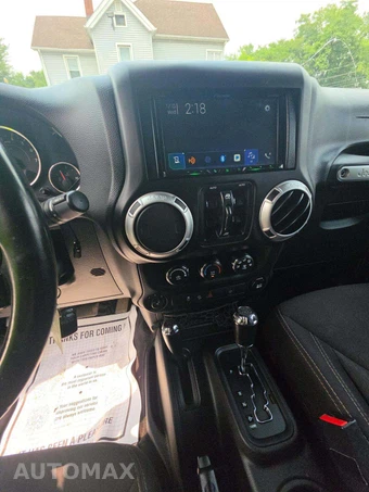2014 Jeep Wrangler Unlimited Sahara - miniatura 10