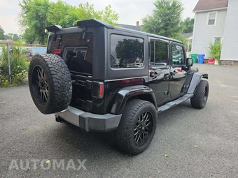 2014 Jeep Wrangler Unlimited Sahara - miniatura 3