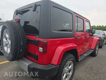 2014 Jeep Wrangler Unlimited Sahara - miniatura 4