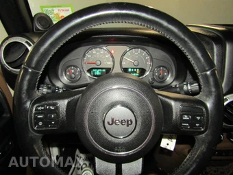 2014 Jeep Wrangler Unlimited Sahara - miniatura 11