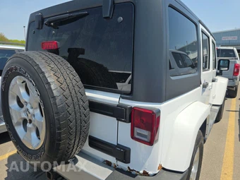 2014 Jeep Wrangler Unlimited Sahara - miniatura 4