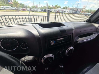 2014 Jeep Wrangler Unlimited Sahara - miniatura 10