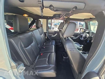 2014 Jeep Wrangler Unlimited Sahara - miniatura 16