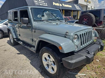 2014 Jeep Wrangler Unlimited Sahara - miniatura 4
