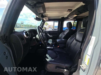 2014 Jeep Wrangler Unlimited Sahara - miniatura 6