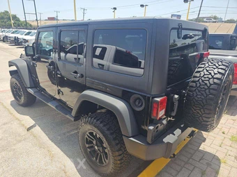 2014 Jeep Wrangler Unlimited Sport - miniatura 2