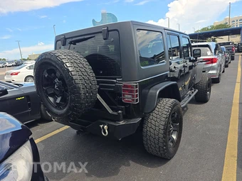 2014 Jeep Wrangler Unlimited Sport - miniatura 4
