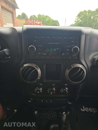 2014 Jeep Wrangler Unlimited Sport - miniatura 10